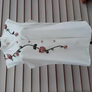 CREAM COLOR VEST WITH FLOWERS